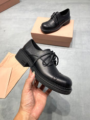MIUMIU 26S LACE-UP LOAFERS IN BLACK GRAINED CALFSKIN