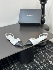 CHANEL 26S POINTED-TOE SLINGBACKS IN WHITE AND BLACK LAMBSKIN