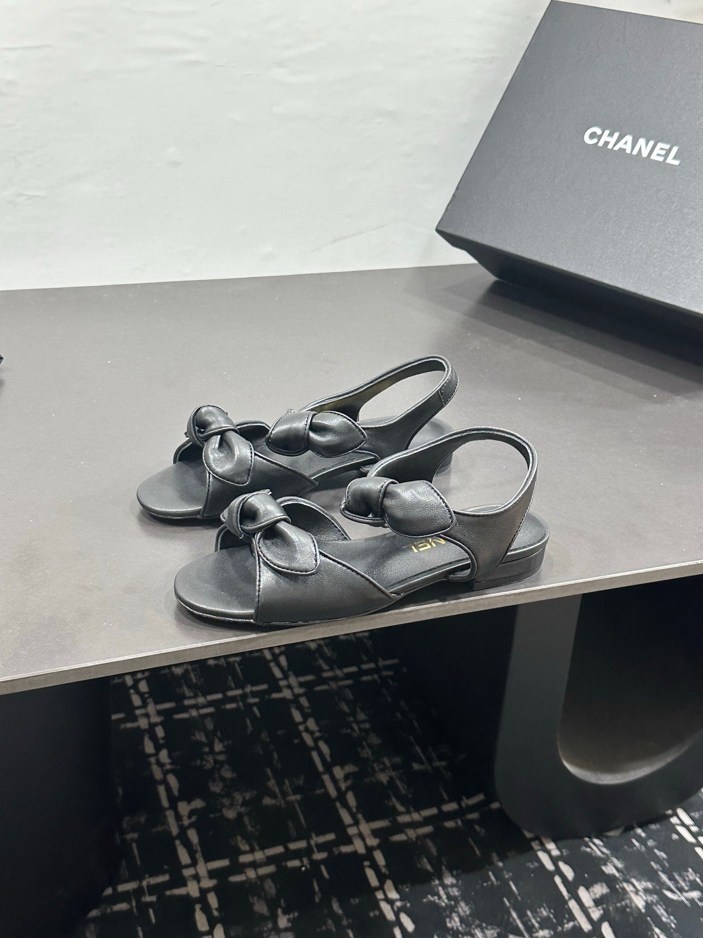 CHANEL 26S BOW SANDALS IN BLACK CALFSKIN