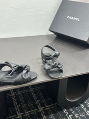 CHANEL 26S BOW SANDALS IN BLACK CALFSKIN
