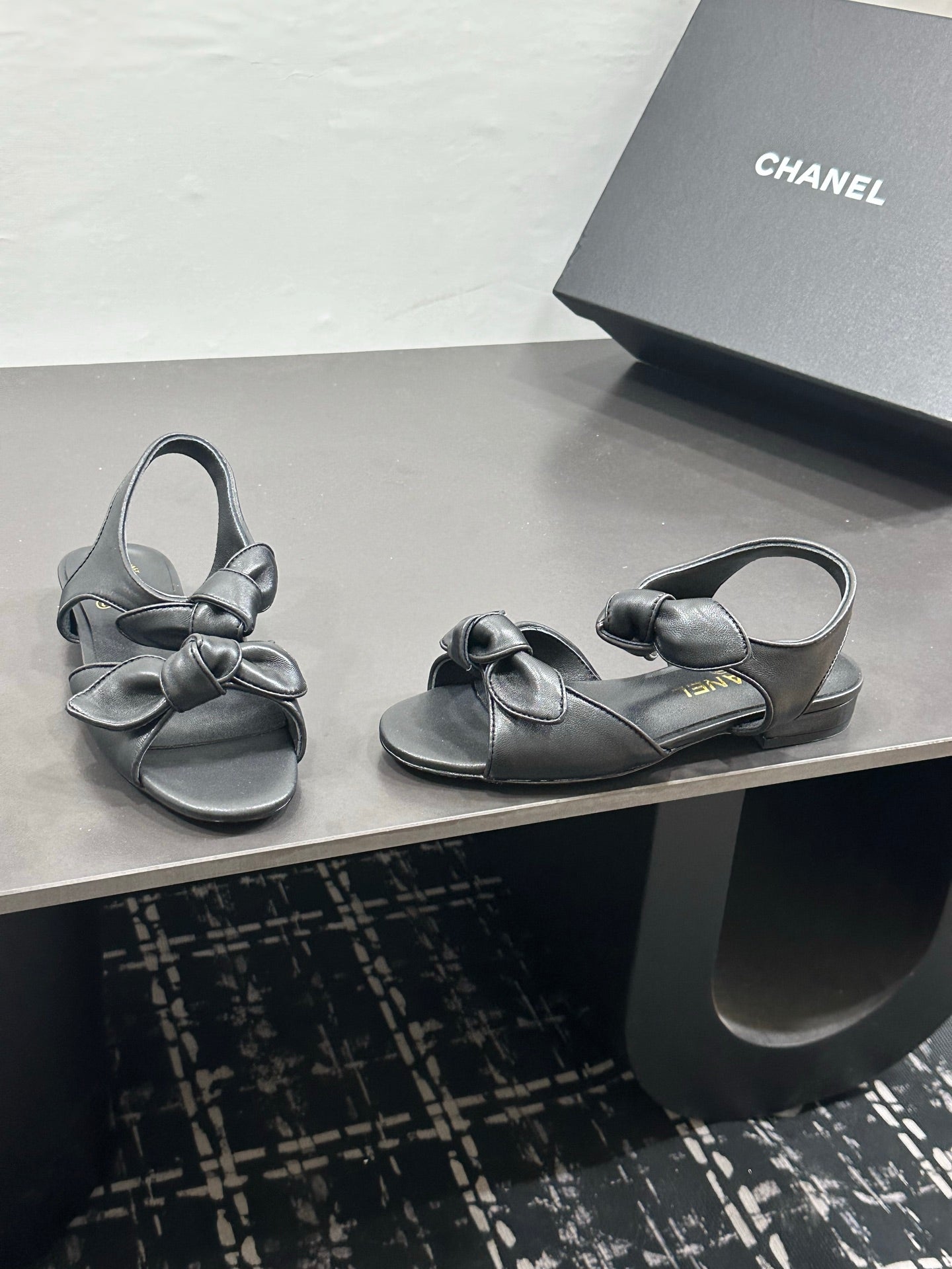 CHANEL 26S BOW SANDALS IN BLACK CALFSKIN