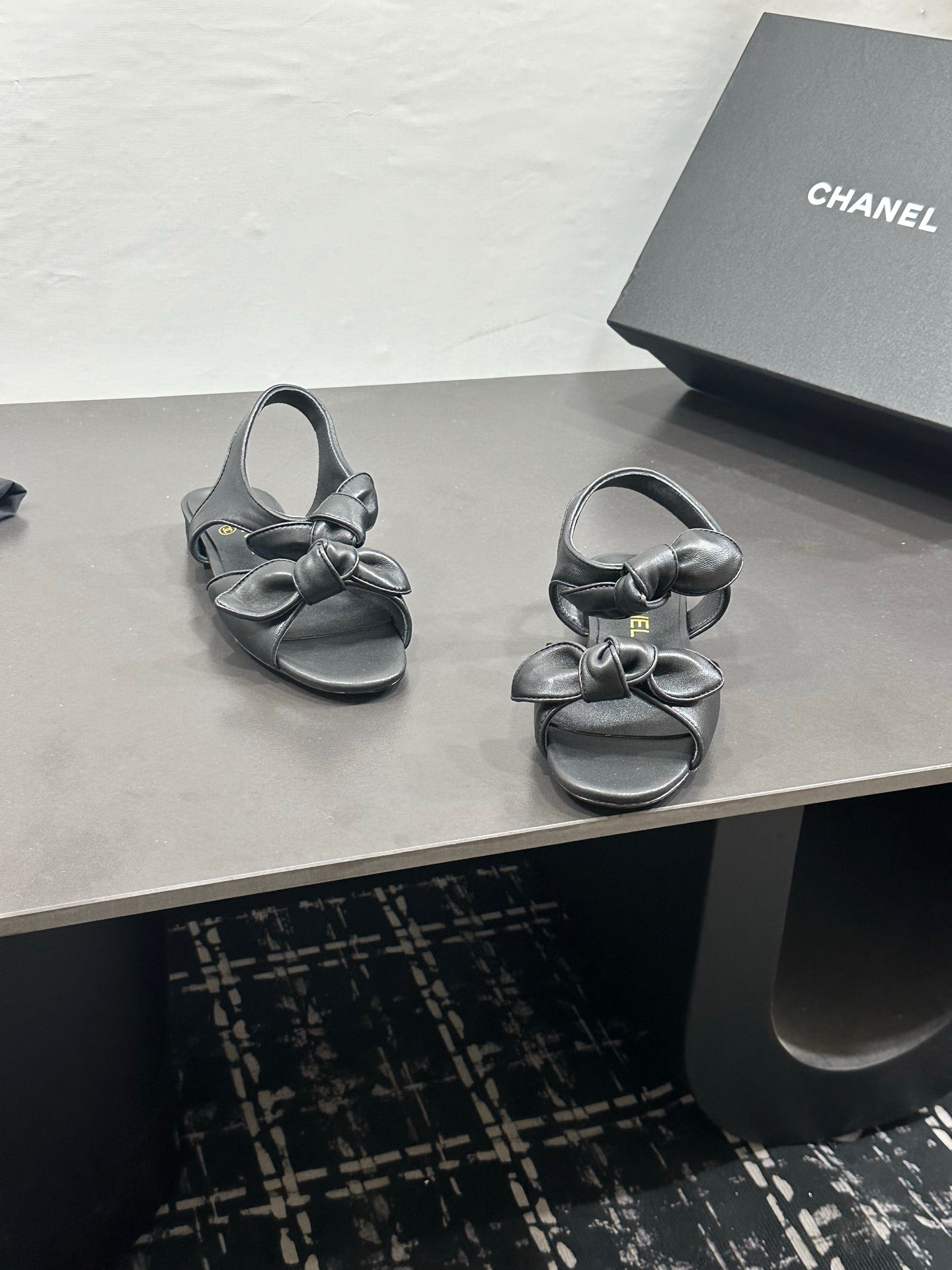 CHANEL 26S BOW SANDALS IN BLACK CALFSKIN