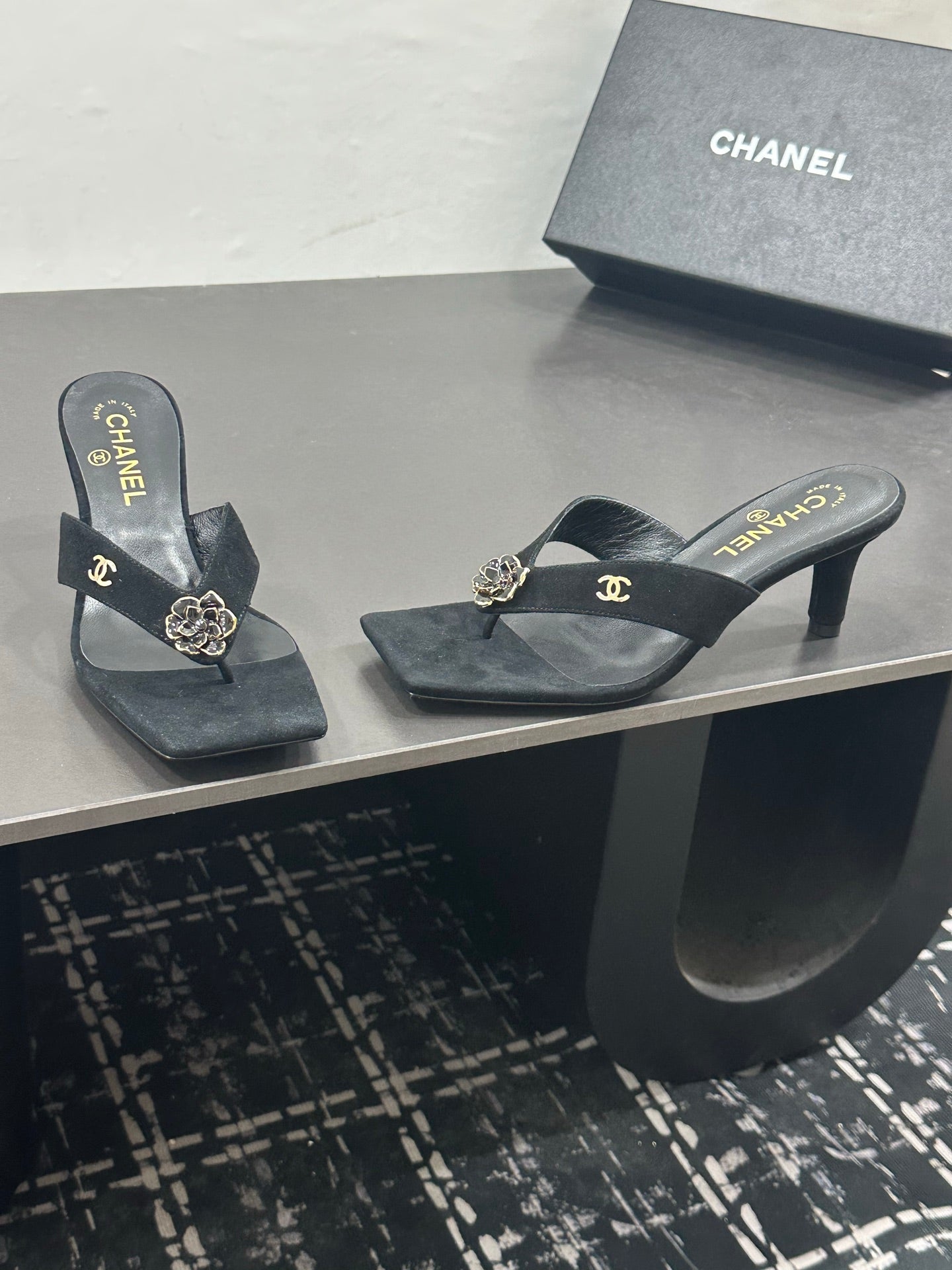 CHANEL 26S HIGH-HEEL THONG SANDALS IN BLACK SUEDE WITH FLOWER DETAIL