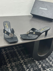 CHANEL 26S HIGH-HEEL THONG SANDALS IN BLACK SUEDE WITH FLOWER DETAIL
