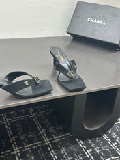 CHANEL 26S HIGH-HEEL THONG SANDALS IN BLACK SUEDE WITH FLOWER DETAIL