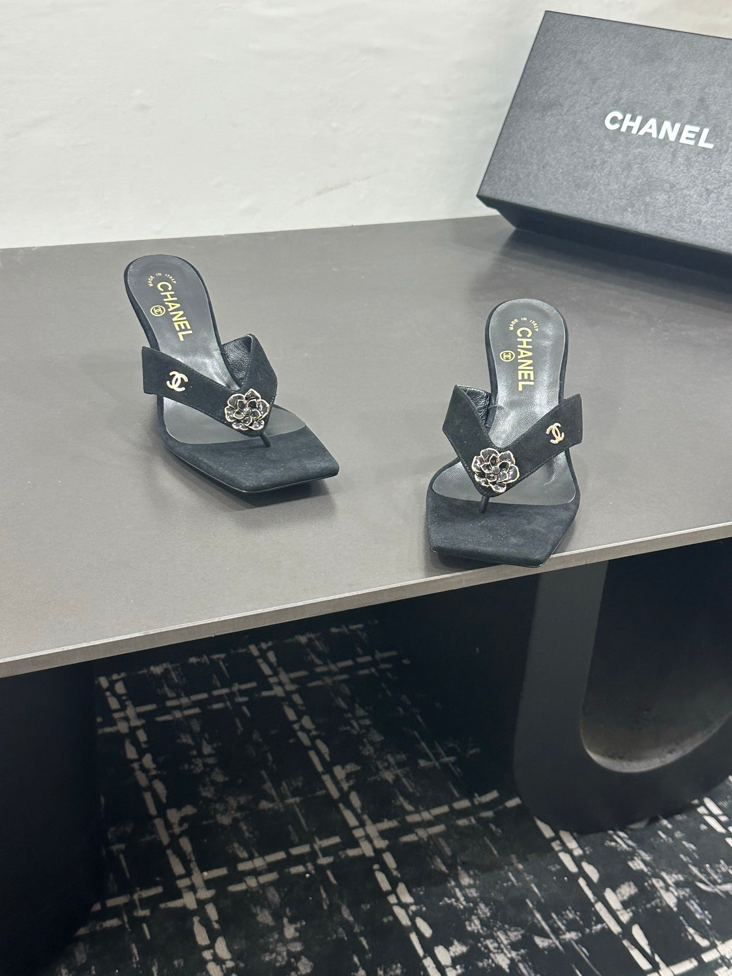 CHANEL 26S HIGH-HEEL THONG SANDALS IN BLACK SUEDE WITH FLOWER DETAIL