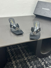 CHANEL 26S HIGH-HEEL THONG SANDALS IN BLACK SUEDE WITH FLOWER DETAIL