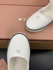 MIUMIU 26S MARY JANE FLATS IN WHITE CANVAS LOGO