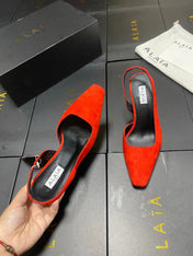 ALAIA 26S WEDGE SLINGBACKS 95 MM IN ORANGE RED SUEDE
