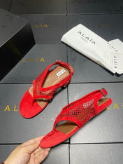 ALAIA 26S FLAT MESH THONG SANDALS IN RED SUEDE