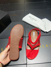 ALAIA 26S FLAT MESH THONG SANDALS IN RED SUEDE