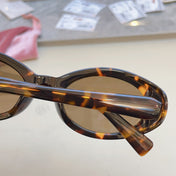 MIUMIU 26S OVAL FRAME IN ACETATE 415247