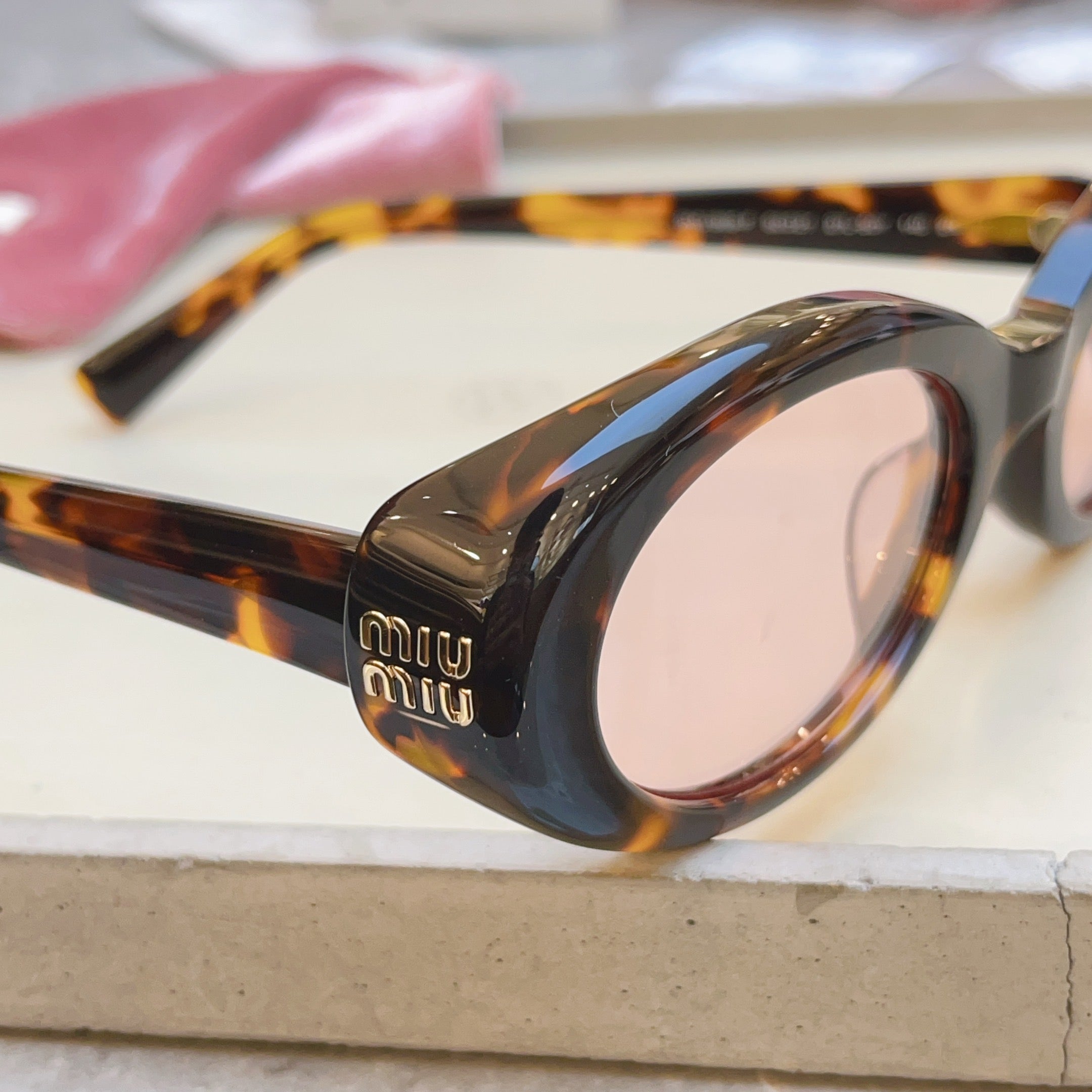 MIUMIU 26S OVAL FRAME IN ACETATE 415248