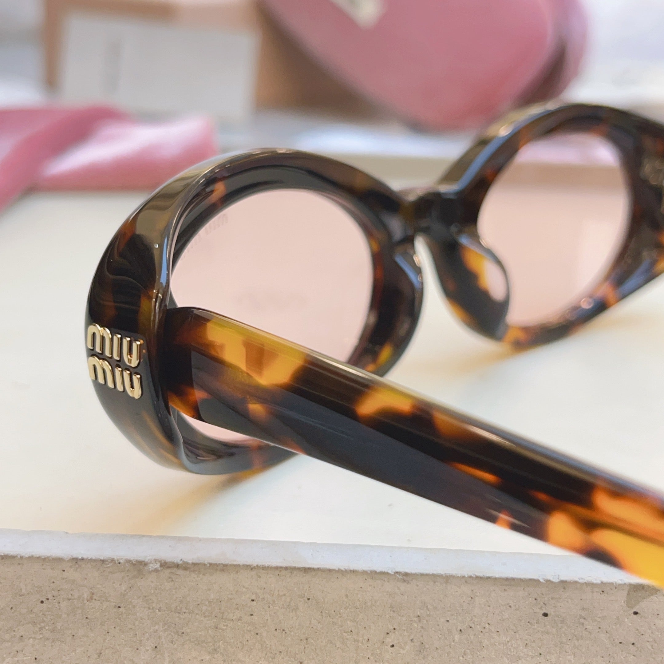 MIUMIU 26S OVAL FRAME IN ACETATE 415248