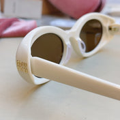 MIUMIU 26S OVAL FRAME IN ACETATE 415249