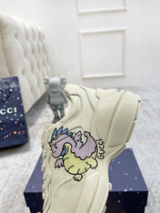 GG RHYTON TRAINER WHITE LAMBSKIN WITH PURPLE DINO MOTIF