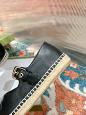 GG CROSS STRAP FLAT SHOES IN BLACK CALFSKIN WITH STRAW SOLE