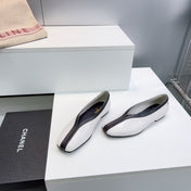 CHANEL 26S SQUARE-TOE FLATS IN WHITE LAMBSKIN WITH BLACK TRIM