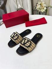 Vlogo embellished leather-trimmed raffia slides black