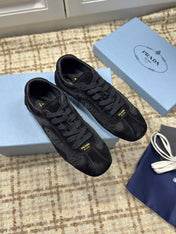 PRADA 26S LOW TOP SNEAKERS IN BLACK NYLON AND SUEDE