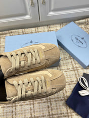 PRADA 26S LOW TOP SNEAKERS IN OLIVE BROWN NYLON AND SUEDE