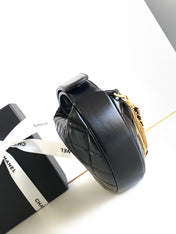 CC 16 MINI POUCH IN BLACK GRAINED CALFSKIN AND GOLD METAL