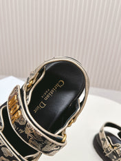 DIOR BACK-STRAP SANDALS 25S IN BLACK AND GOLD CALFSKIN WITH BUTTERFLY MOTIF