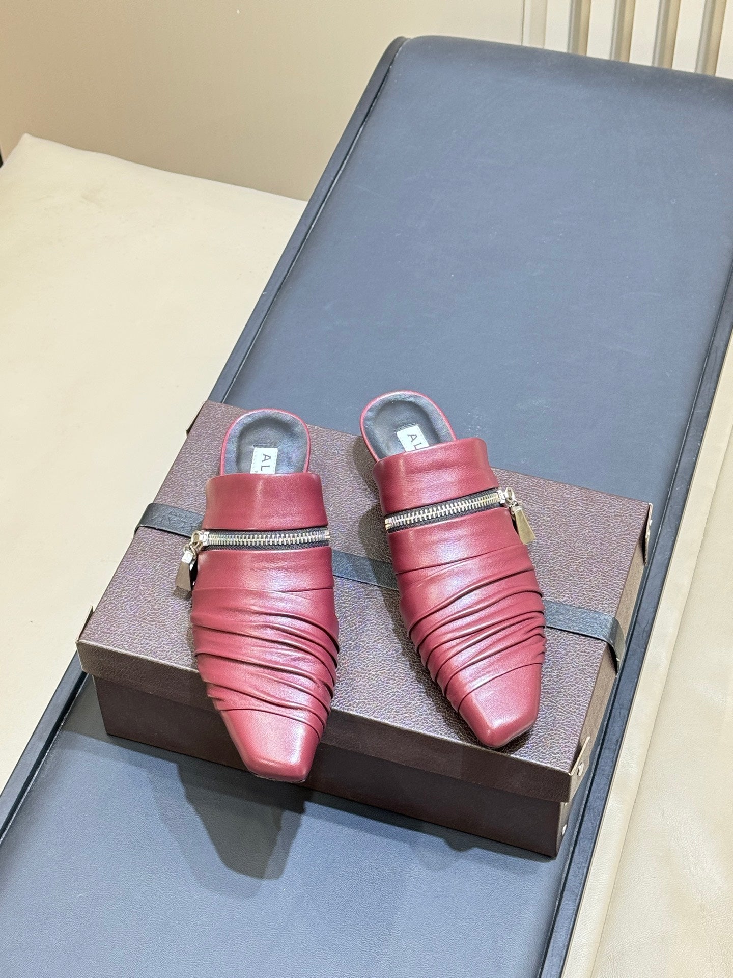 ALAIA 26S PLEATED MULES IN DARK RED LAMBSKIN