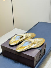 ALAIA 26S BALLET FLATS IN GOLD LAMBSKIN