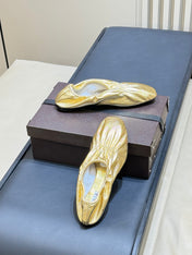 ALAIA 26S BALLET FLATS IN GOLD LAMBSKIN