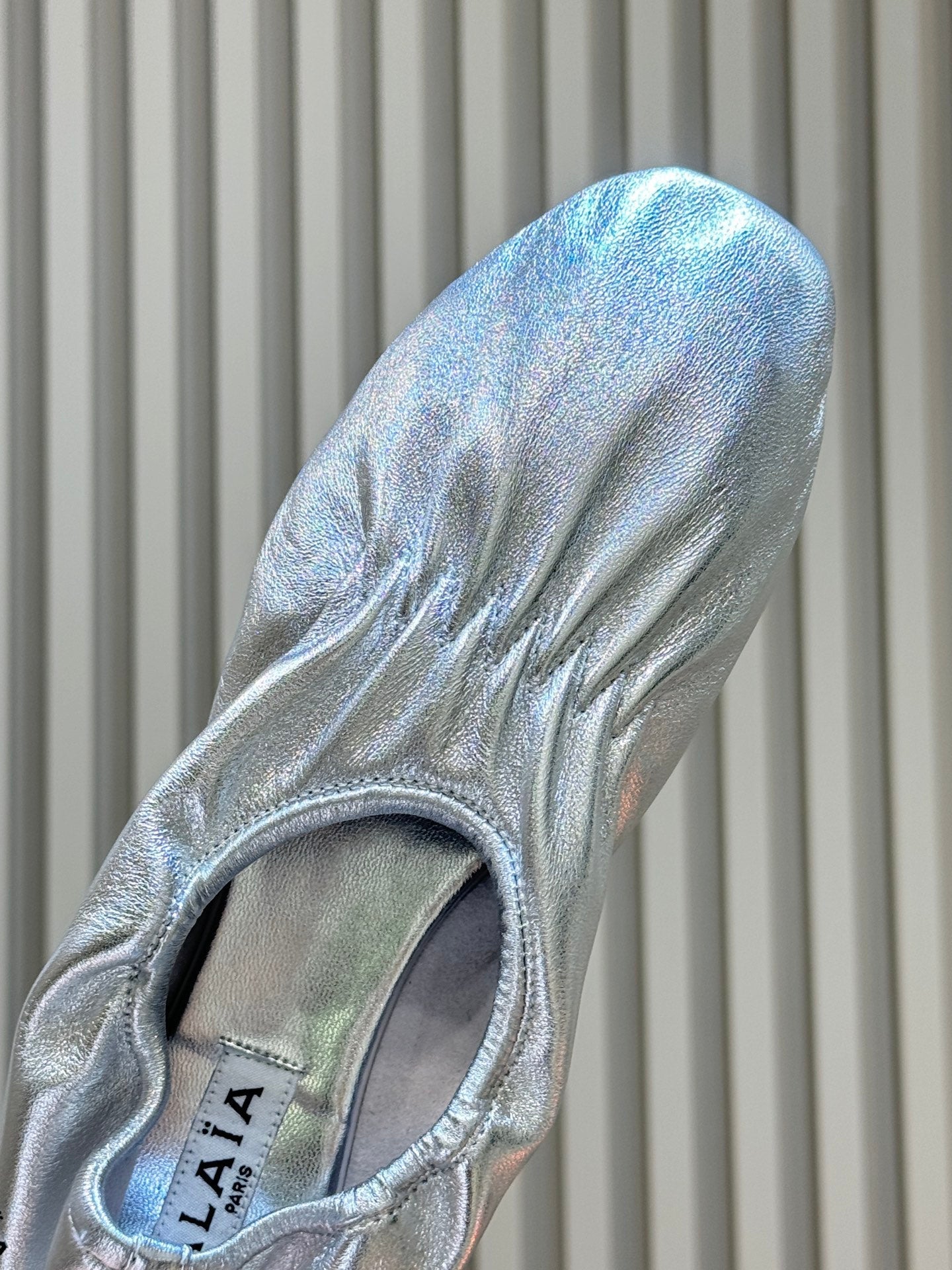 ALAIA 26S BALLET FLATS IN SILVER LAMBSKIN