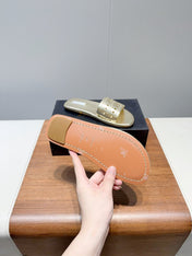 ALAIA FLAT SANDALS WITH PERFORATED STRAPS 25S IN GOLD LAMBSKIN