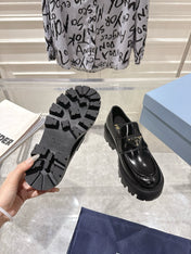 PRADA 26S PLATFORM LOAFERS 45MM IN BLACK SHINE CALFSKIN