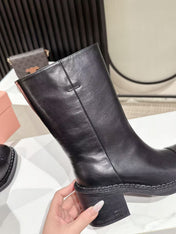 MIUMIU 26S PLATFORM HIGH-HEEL BOOTS 50MM IN BLACK GLOSSY CALFSKIN