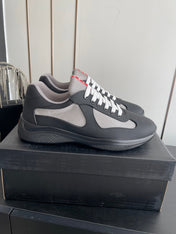 PRADA 26S AMERICA CUP SNEAKERS IN BLACK SOFT RUBBER AND BIKE FABRIC