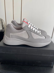 PRADA 26S AMERICA CUP SNEAKERS IN COOL GRAY SOFT RUBBER AND BIKE FABRIC