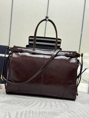 PRADA 25S BONNIE EXTRA-LARGE 42 IN DARK BROWN GLOSSY CALFSKIN GOLD HARDWRE