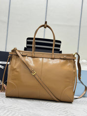 PRADA 25S LUX SOFT BAG 42 IN CARAMEL GLOSSY CALFSKIN GOLD HARDWARE