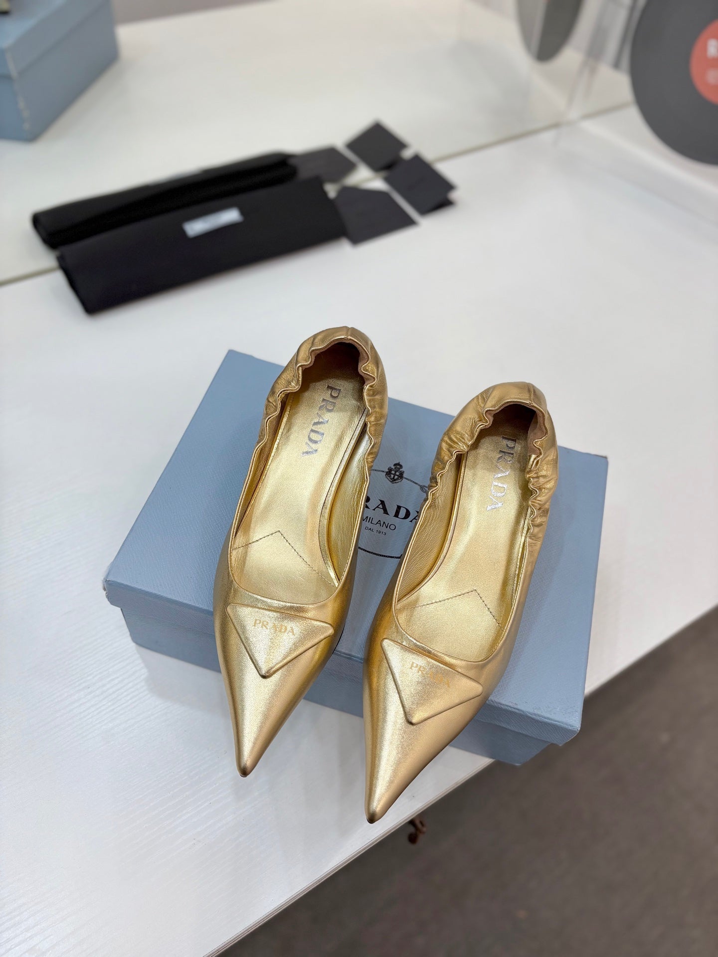 PRADA 26S PUMPS 55MM IN GOLD CALFSKIN WITH LOGO