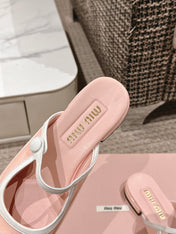 FLAT MULE IN PALE PINK PATENT CALFSKIN