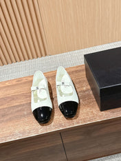 CHANEL 25S BALLET MARY JANES BLACK AND IVORY IN CALFSKIN