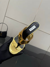 ALAIA HEELED THONG 25S IN GOLD PATENT LEATHER