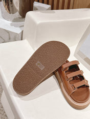 TRIOMPHE SANDALS IN BROWN CALFSKIN