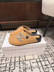 FLAT MULE IN SEPIA BEIGE CALFSKIN