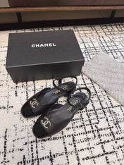 FLAT SLINGBACKS IN BLACK CALFSKIN