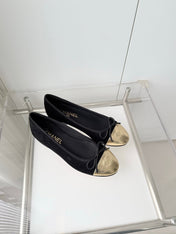 CHANEL 26S BALLET FLATS IN BLACK SUEDE WITH GOLD TOE CAP AND BOW
