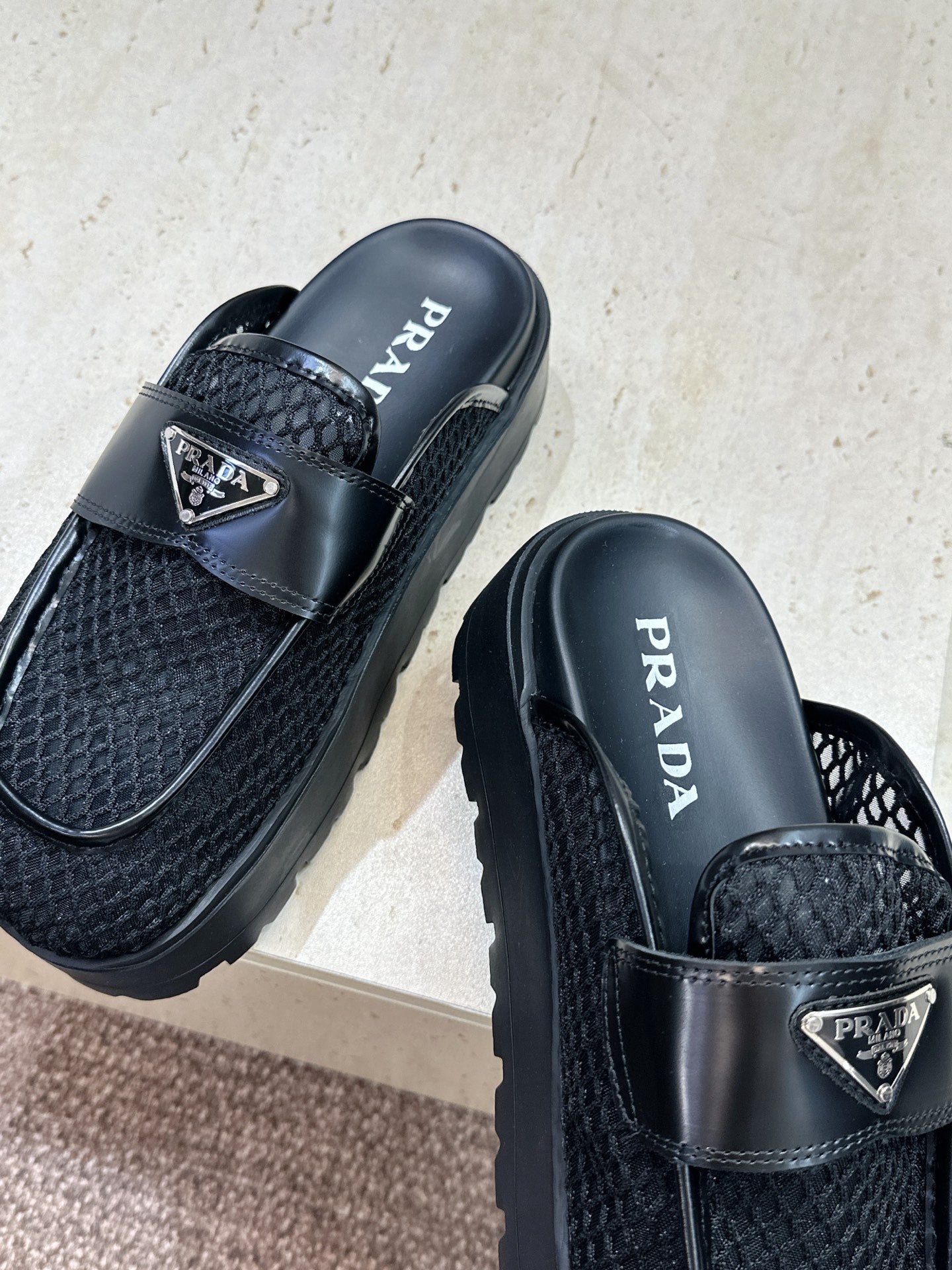 PRADA 26S MULE LOAFERS IN BLACK MESH AND CALFSKIN