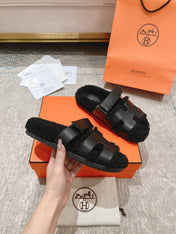 CHYPRE SANDAL IN BLACK SHEARLING AND CALFSKIN