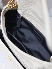 NIKI MEDIUM 28 IN WHITE ELEPHANT PATTERN LAMBSKIN GOLD LOGO