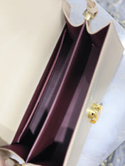 CASSANDRA TOP HANDLE BAG 24 IN BEIGE CALFSKIN GOLD HARDWARE